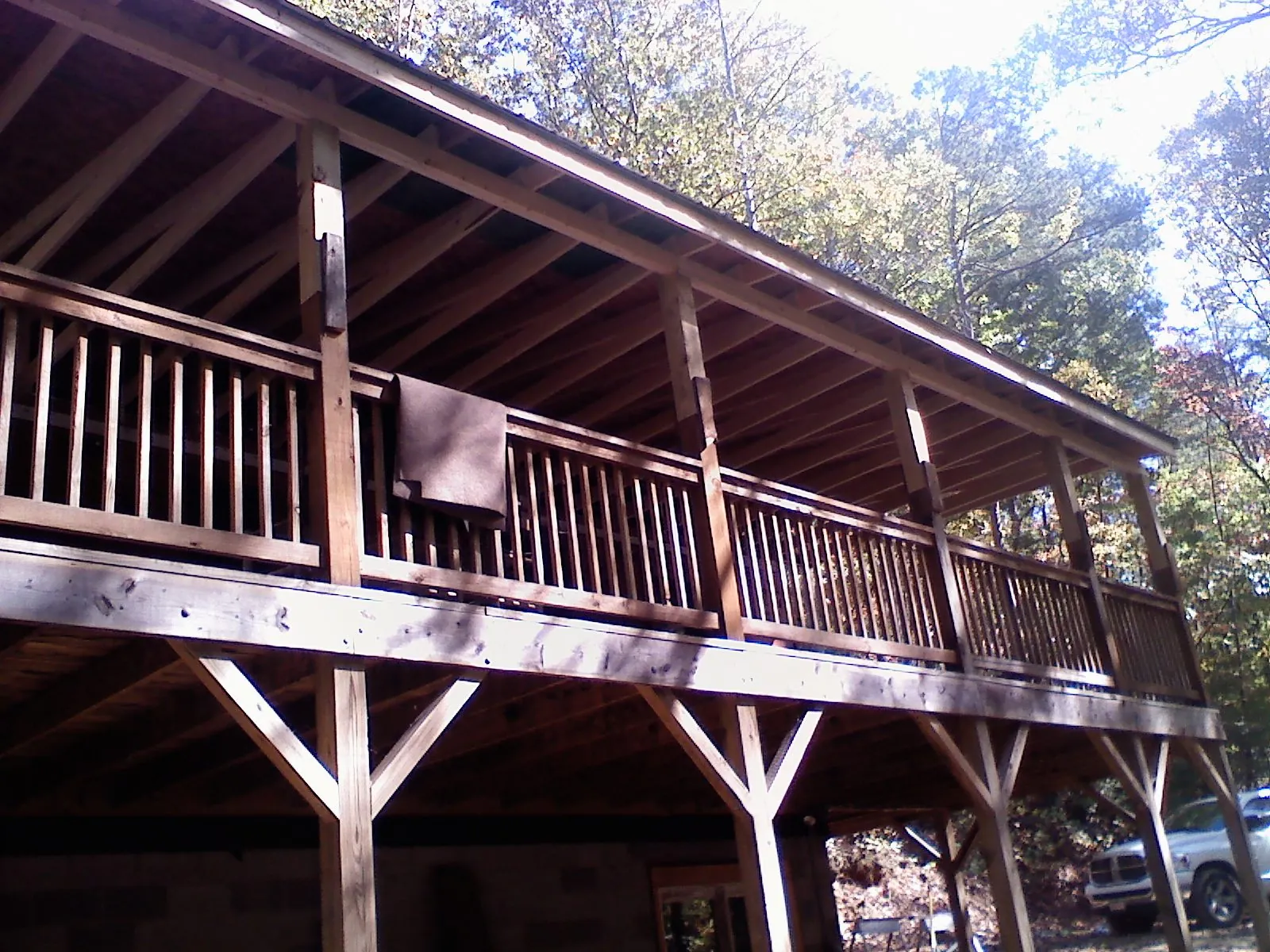 Timber framing under a new elevated porch and deck — Roof Leak Repair in Westchester by Roofing Brothers